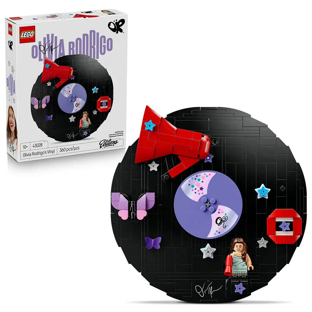 LEGO Olivia Rodrigo Vinyl set pairs its white retail box with a black brick record display, purple disc, red megaphone, butterfly details and singer minifigure.
