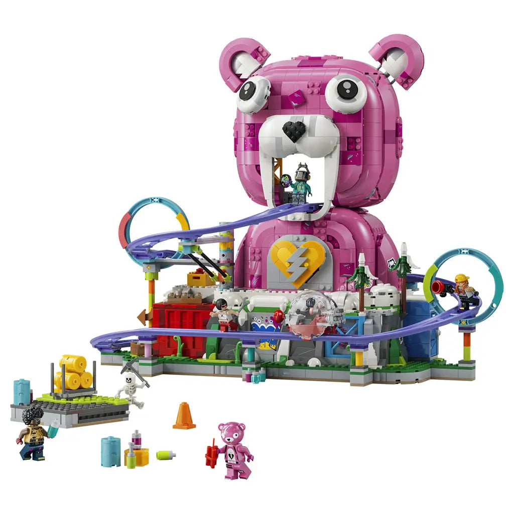 LEGO Fortnite Rave Cave in pink, white and purple plastic bricks, featuring a large bear-shaped venue, looping rail track, heart emblem, snowy details and minifigures.
