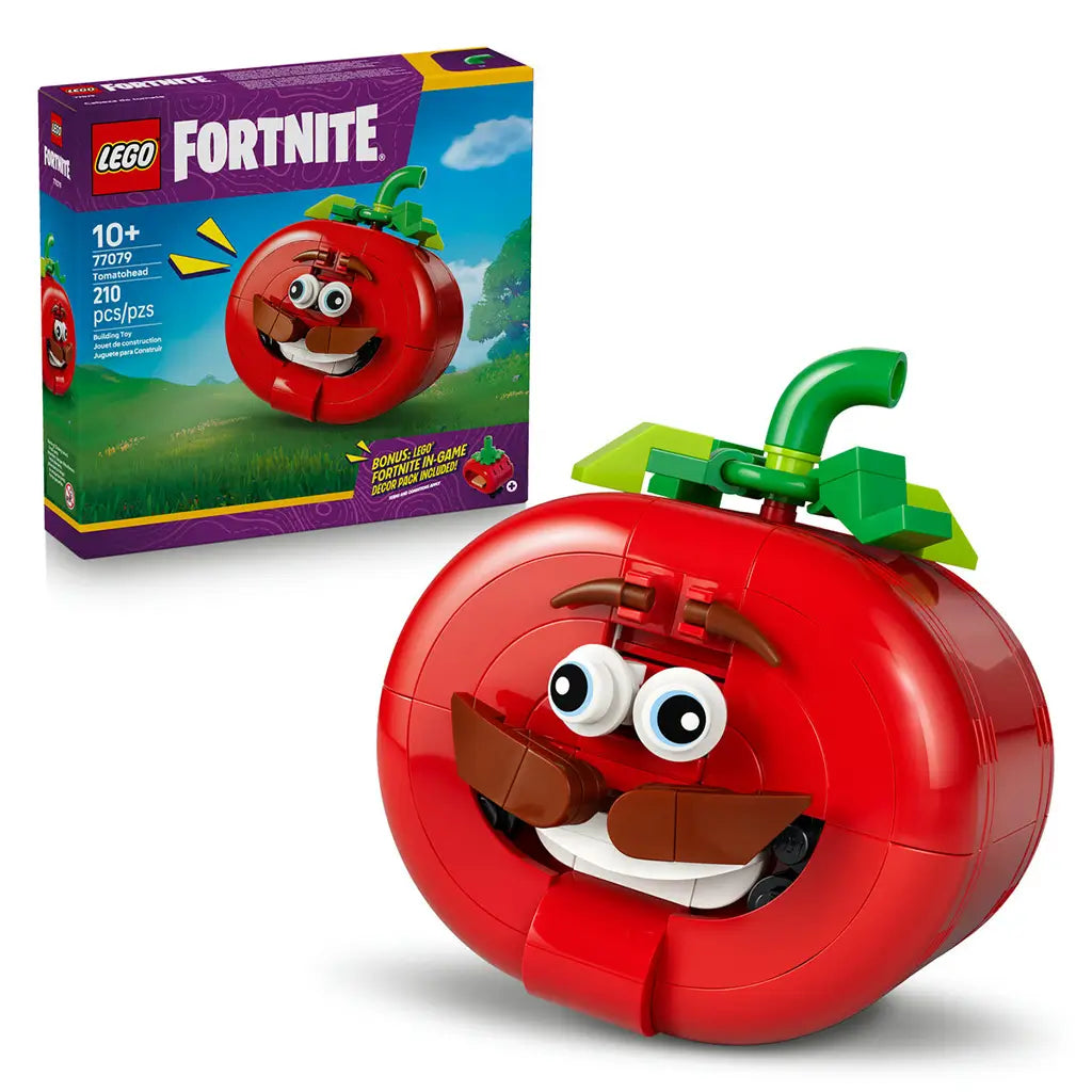 LEGO Fortnite Tomatohead set 77079 pairs a red, green and brown brick-built smiling tomato head with its purple retail box, showing the 210-piece building toy.