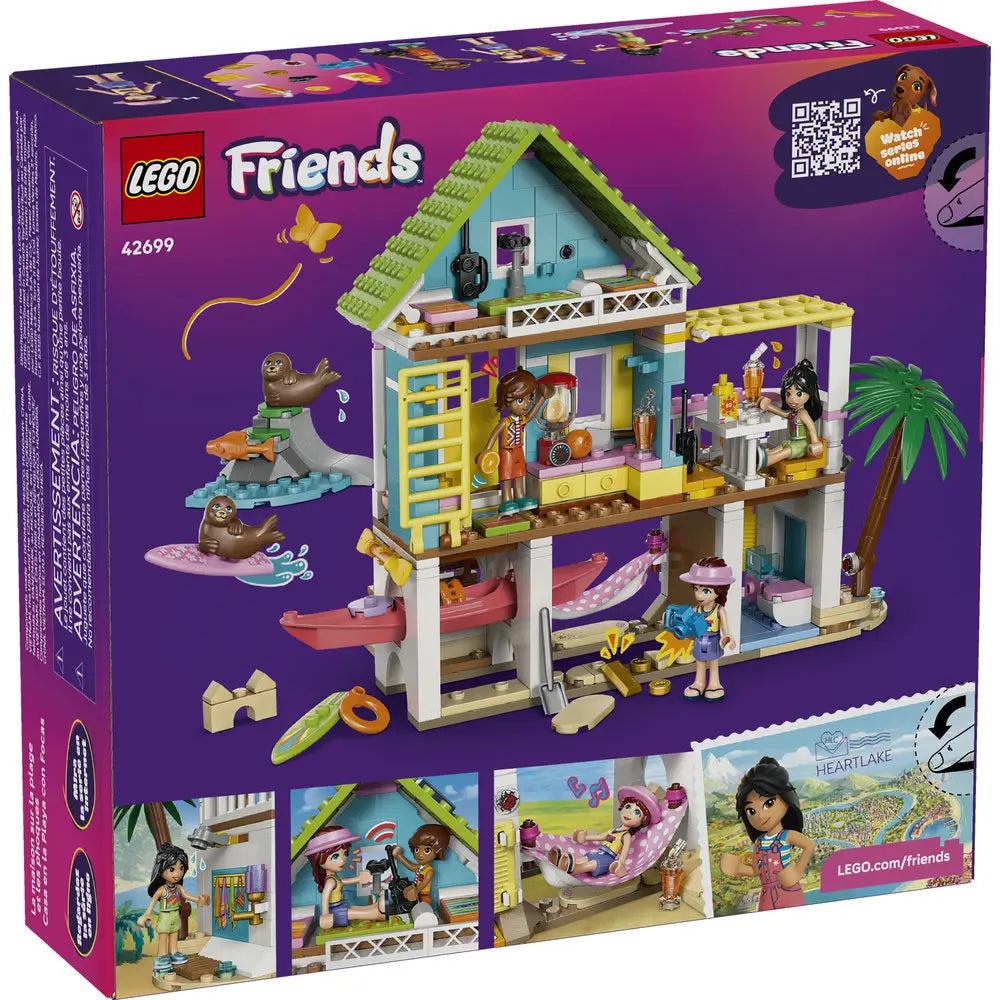 LEGO Friends Beach House with Seals back-of-box packaging, purple cardboard panel showing included minidolls, seals, accessories, interior rooms, and modular build details with play features illustrated on a colorful background.