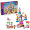 LEGO Friends Candy & Cupcake Ferris Wheel 42700 set in pink, blue, and white plastic includes a candy-themed ride, two snack stalls, three mini-dolls, and colorful accessories.