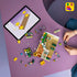 LEGO Friends Creative Flower Shop set in green, pink and white plastic, under construction with mini-dolls, bicycle and flower pieces beside digital instructions.