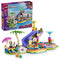 LEGO Friends Fun Water Park Day 42676 in pink, aqua and purple plastic, with pool, slide, splash towers, palm tree, two mini-dolls, pets and retail box.