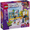 LEGO Friends Heartlake City Convenience Store box front featuring a purple package with illustrated grocery store build, shelves of food, checkout counter, shopping cart, dog, and minifigures for everyday play.