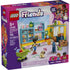 LEGO Friends Heartlake City Convenience Store box front featuring a purple package with illustrated grocery store build, shelves of food, checkout counter, shopping cart, dog, and minifigures for everyday play.