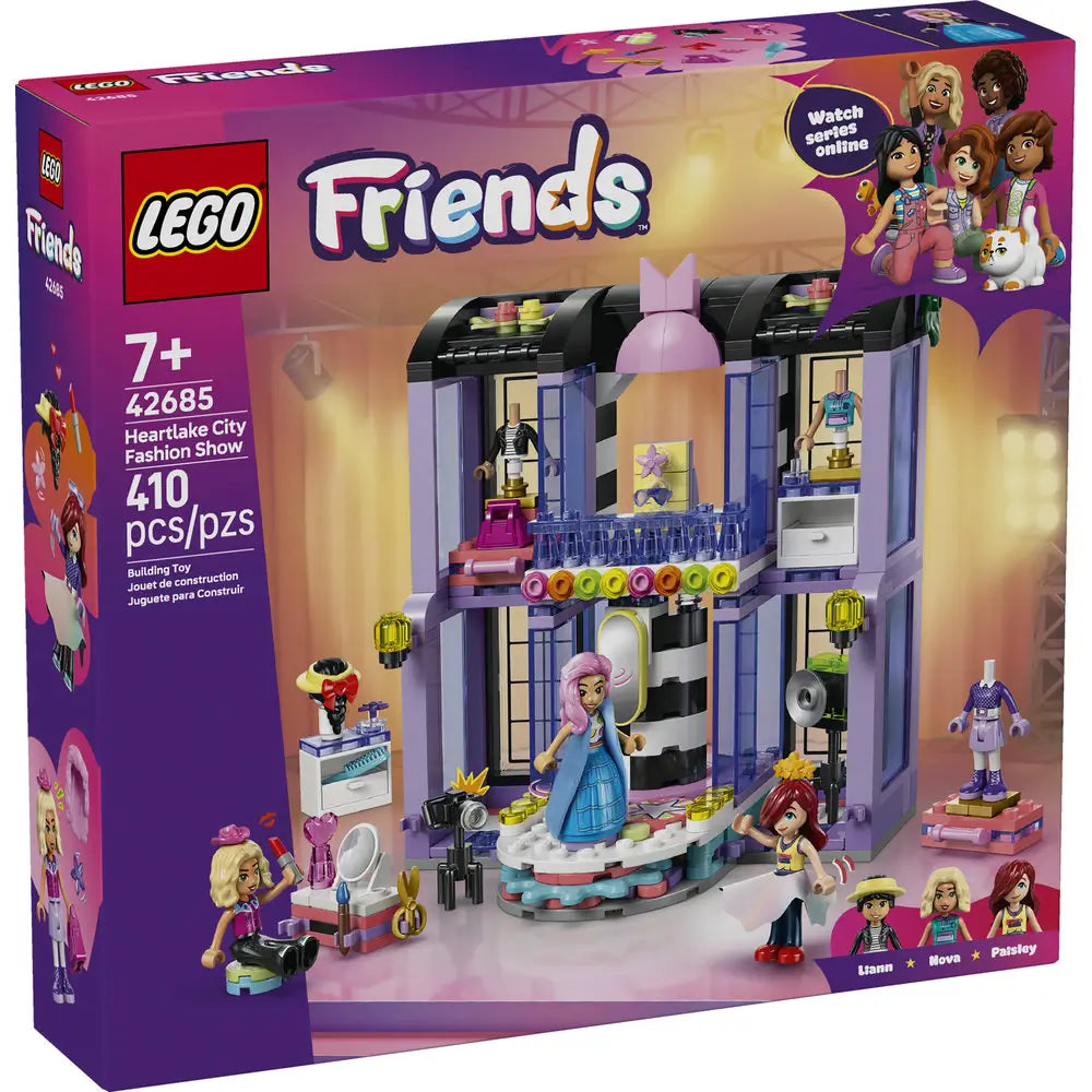 LEGO Friends Heartlake City Fashion Show box front displaying a purple package with illustrated runway building, rotating stage, outfits, cameras, accessories, and minifigures, highlighting a creative fashion themed playset for kids.
