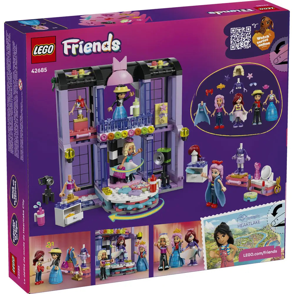 LEGO Friends box back view showing interior fashion show features including rotating runway stage, outfit changes, accessories, minifigures, and illustrated play functions inside the pastel plastic building.