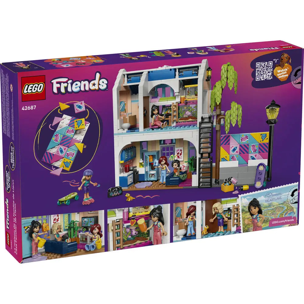 LEGO Friends box back view showing interior rooms of the pastel plastic family house, including kitchen, bedroom, and living spaces, with play features, accessories, minifigures, and illustrated activity details.