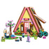 LEGO Friends Nature Glamping Cabin 42682 in pink, yellow and brown plastic, with A-frame cabin, two mini-dolls, black cat, teal bike and camping accessories.