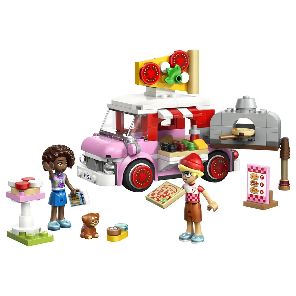 LEGO Friends Pizza Truck 42694 in pink, red, white and gray plastic, with pizza oven, two mini-dolls, puppy, menu board and food accessories on white.
