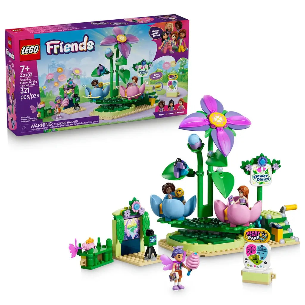 LEGO Friends Spinning Flower & Fairy Teacup Ride set 42702 pairs its retail box with pink and blue flower seats, a tall purple flower, mini-dolls and park accessories.