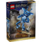 Front of LEGO Harry Potter Cornish Pixie box showing the articulated blue pixie figure with translucent wings, book and wand accessories, and clear display stand on dark blue retail packaging.