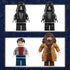 LEGO Harry Potter minifigure lineup displays black and dark gray plastic Death Eaters alongside Harry Potter and Rubeus Hagrid figures, highlighting detailed printed torsos, hoods, hair pieces, and neutral studio background presentation.