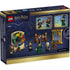 LEGO Harry Potter building set packaging shows a dark blue cardboard box with glossy finish, featuring minifigures, Sorting Hat play functions, potion accessories, and illustrated Hogwarts classroom scenes across the detailed back panel.
