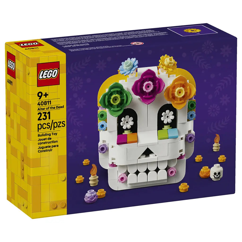 LEGO Altar of the Dead 40811 box front shows the 231-piece white brick skull with colorful flowers, candles, offerings, and skull accessory on purple packaging.