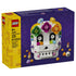 LEGO Altar of the Dead 40811 box front shows the 231-piece white brick skull with colorful flowers, candles, offerings, and skull accessory on purple packaging.