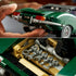 LEGO Icons Jaguar E-Type details show the dark green brick-built rear body, silver bumper and lights above a tan storage compartment holding miniature silver hand tools.