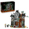 LEGO Icons Mayor Manor set 11383 features a gray and brown plastic gothic mansion with stained-glass windows, twisting tree, three minifigures, cat and rat on white.