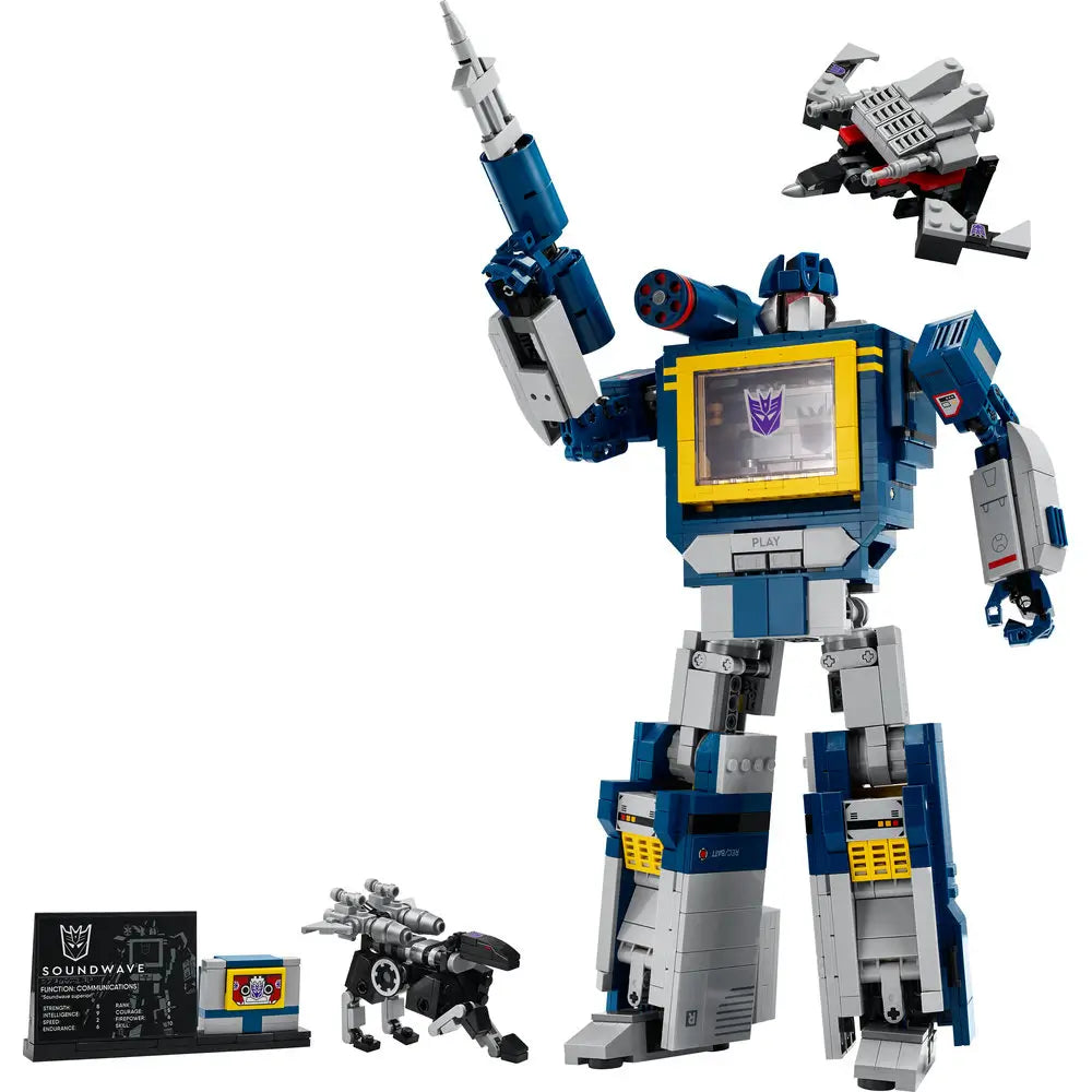 LEGO Transformers Soundwave build with cassette companions Ravage and Laserbeak, showing the robot in a dynamic pose with accessories including a plaque, cassette, and detailed weapon arm.