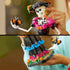 LEGO Ideas La Catrina model features a white skeleton in a black dress with magenta, blue and orange floral details, holding a butterfly while hands adjust her hat.