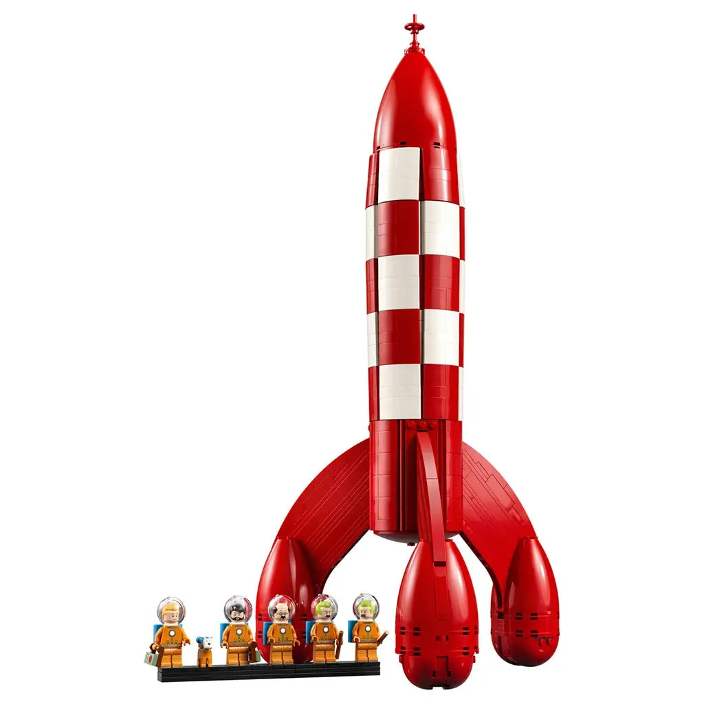 LEGO Ideas Tintin Moon Rocket collectible features a red and white plastic rocket with rounded fins and astronaut minifigures, presented upright against a clean white studio background.