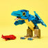 LEGO Jurassic World Baby Dinosaur Pteranodon model features a blue plastic brick-built flying dinosaur with tan legs and a red seafood piece displayed on a yellow background.