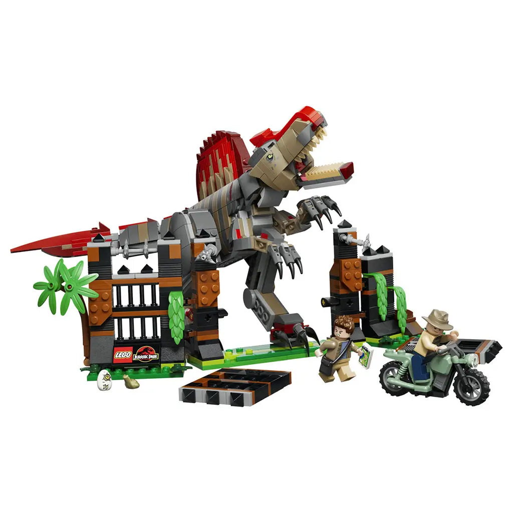 LEGO Jurassic World Spinosaurus playset features a gray, tan and red brick dinosaur with open jaws breaking through an orange and black enclosure beside two minifigures.