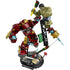 LEGO Marvel Hulkbuster vs Hulk display shows red and gold plastic Hulkbuster armor with bulky mechanical textures battling a green Hulk figure, posed dynamically on a detailed rubble base inspired by Avengers: Age of Ultron.