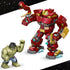 LEGO Marvel Hulkbuster and Hulk figures are shown in scale comparison, featuring red and gold armored Hulkbuster with articulated limbs facing a green muscular Hulk minifigure against a clean studio background.