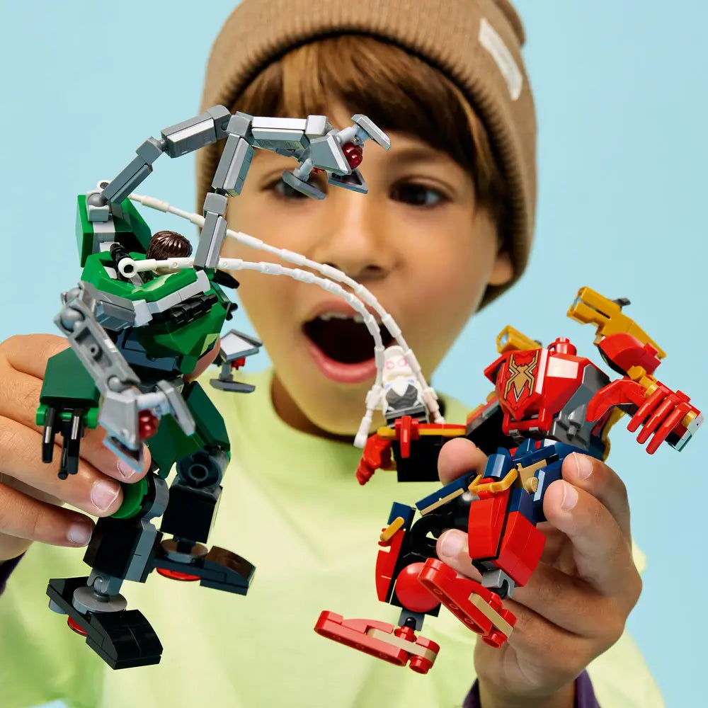 LEGO Marvel Mech Battle lifestyle builder scene shows a child holding the green Doctor Octopus mech and red Spider-Man mech, capturing expressive play, articulated joints, and action-focused posing.