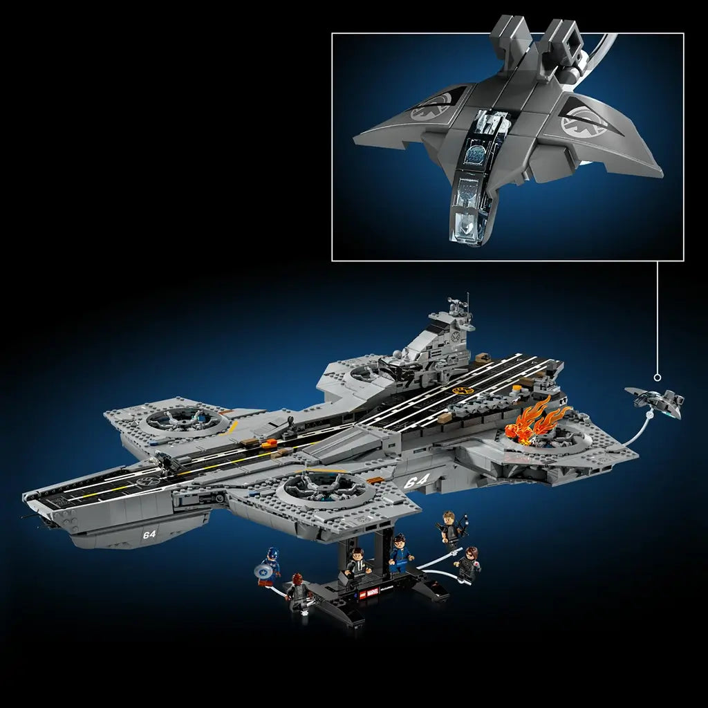 LEGO Marvel Helicarrier, gray plastic aircraft-carrier model with circular rotor platforms, runway details and a small Quinjet aircraft feature, displayed against a dark gradient background.