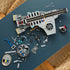 LEGO Marvel building experience, gray plastic Helicarrier sections, minifigures and loose construction pieces arranged across a tabletop during assembly of the aircraft-carrier display model.