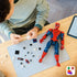 LEGO Marvel Spider-Man building toy, red and blue plastic articulated superhero figure with detailed suit design, web accessory and assembly components on a tabletop background.
