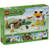 LEGO Minecraft Chicken Farm package back showing white and yellow brick chicken model, plastic block construction toy with modular parts, illustrated play features and instructions on a green Minecraft-themed box.