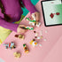 LEGO Minecraft Chicken Jockey Desert Attack build uses white, green and tan bricks as a child assembles the Iron Golem beside loose figures and tablet instructions.
