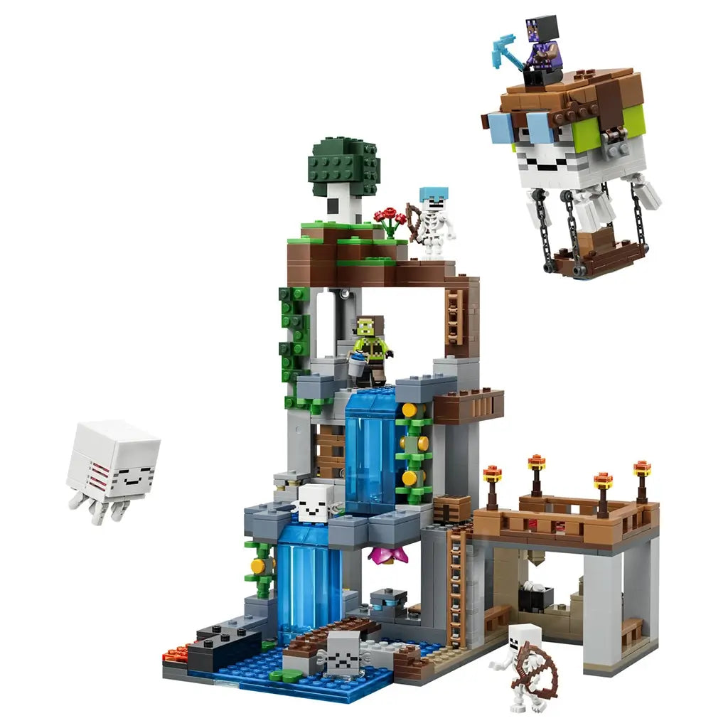 LEGO Minecraft Ghast Station set in gray, brown, green and blue bricks features a tall waterfall station, flying ghast, skeletons and character figures on white.