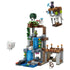 LEGO Minecraft Ghast Station set in gray, brown, green and blue bricks features a tall waterfall station, flying ghast, skeletons and character figures on white.