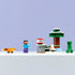 LEGO Minecraft Steve’s Taiga Adventure display showing completed plastic brick taiga scene with tree, snow base, and characters in green, white, and brown, cubic block design for play and display, lined up on a clean surface.