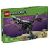 LEGO Minecraft The Ender Dragon set 21595 box front in green shows the black and gray winged dragon on a stand against a purple End scene, with 710 pieces and age 10+.
