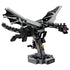 LEGO Minecraft The Ender Dragon model in black and gray bricks features broad articulated wings, a long segmented tail and purple eyes, posed on a dark display stand.