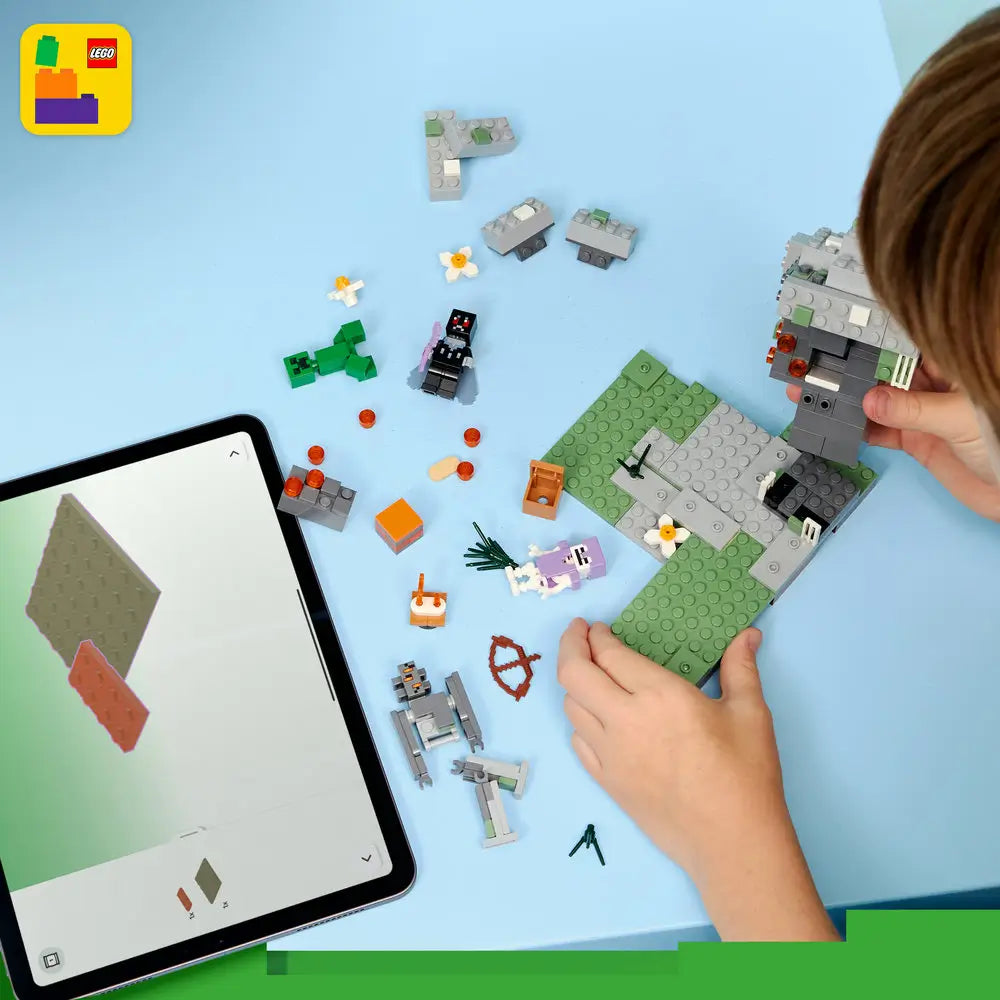 LEGO Minecraft building activity shows a child assembling The Pale Garden set on a light blue surface, with gray and green bricks, mob characters, accessories, and digital instructions visible on a tablet.