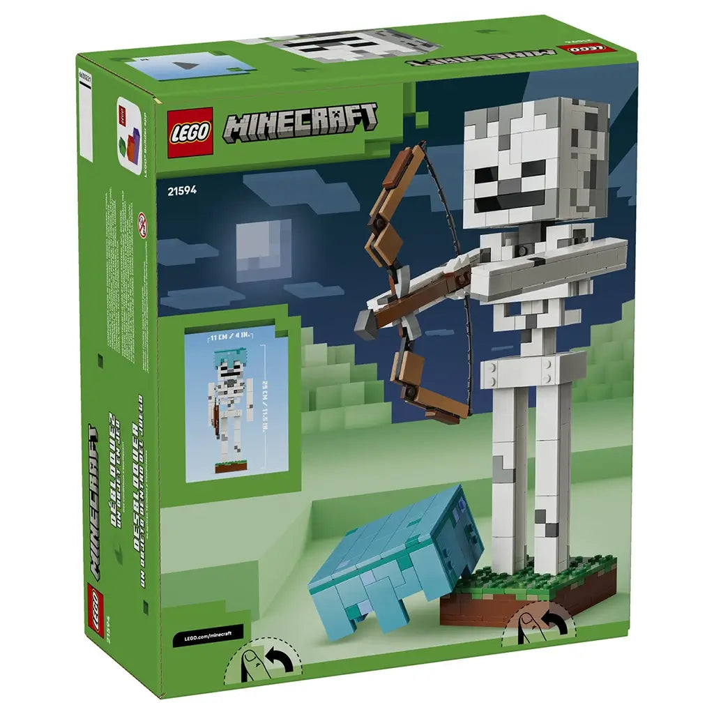 LEGO Minecraft The Skeleton set 21594 box back in green shows the white and gray skeleton with brown bow, turquoise helmet and small turquoise accessory on a grassy base.
