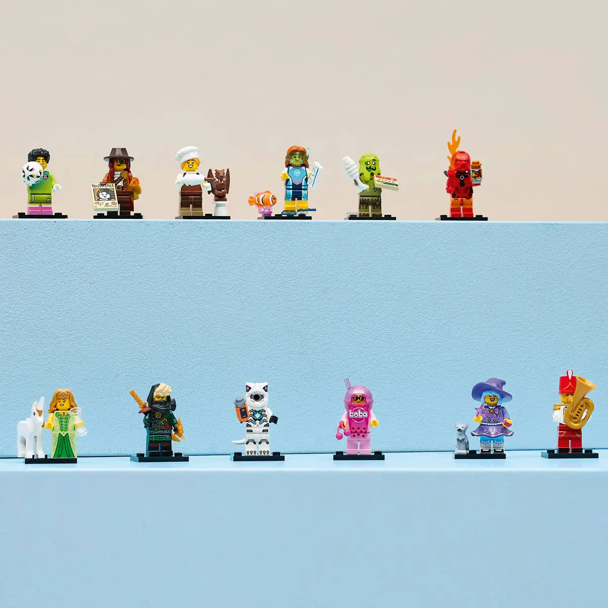 LEGO Minifigures Series 29 characters line pastel blue display blocks with colorful plastic fantasy, sports, and costume figures arranged against a soft beige background.