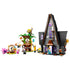 LEGO Despicable Me 4 playset in gray, black, green and yellow plastic shows Gru’s steep-roof mansion, treehouse, zip line, Minions and family figures on white.