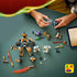 LEGO NINJAGO building toy scene with dark gray and gold mech parts on a green tabletop, jointed limbs, minifigures, and accessories shown mid-build to highlight hands-on construction and imaginative play.