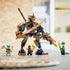 LEGO NINJAGO playset arranged on a tabletop with a completed dark gray and gold mech, articulated stance, translucent orange blade, and minifigures lined up to show finished build and display-ready details.