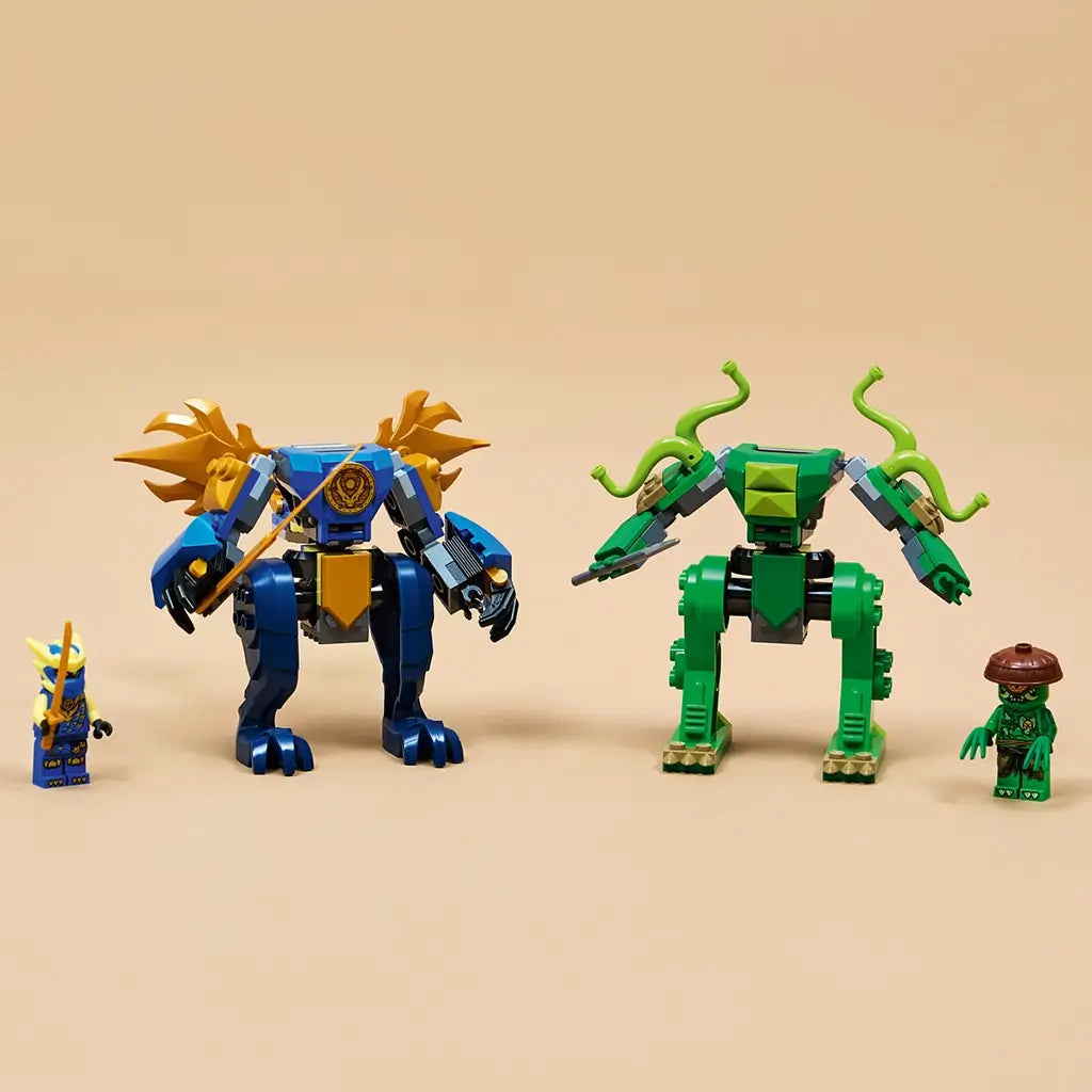 LEGO NINJAGO mech models in blue and green plastic, small articulated robot figures with weapons and minifigures, display toy arranged on a neutral tabletop background.