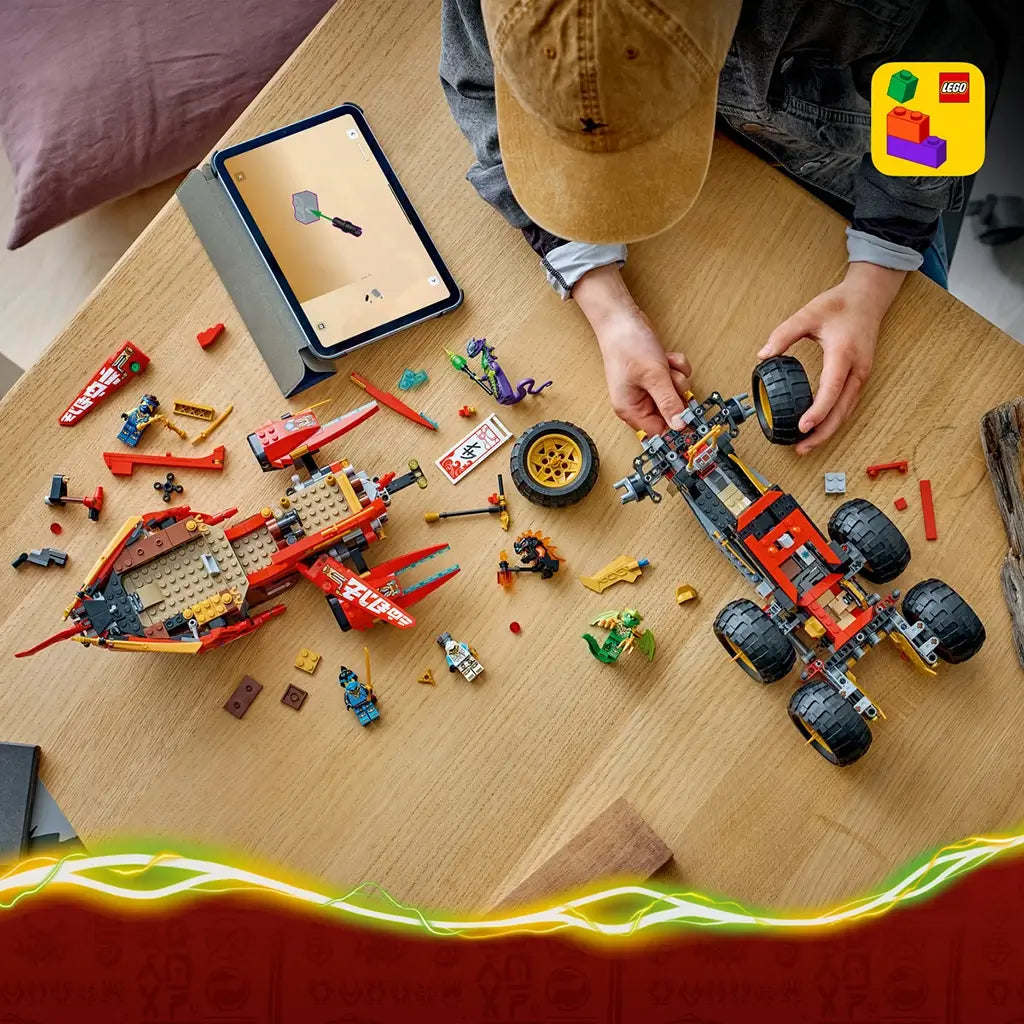 LEGO NINJAGO Land Bounty building scene shows a red and black six-wheel chassis, red ship, minifigures and loose plastic pieces beside digital instructions on a wood table.