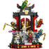LEGO NINJAGO Legacy ninja temple display in red, black, gray, and gold plastic with a tiered shrine structure, decorative gate, and multiple ninja minifigures posed in action on a clean white background.