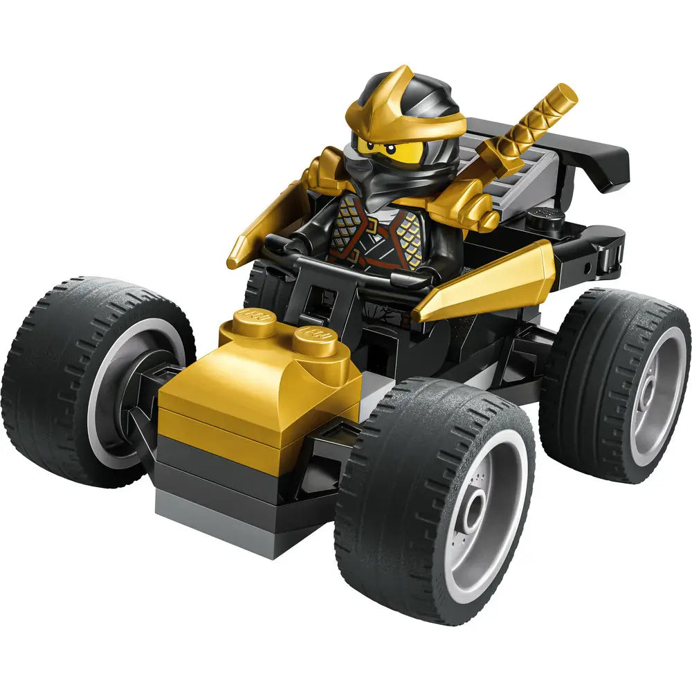 LEGO NINJAGO Cole’s Car built from black and metallic gold plastic bricks, featuring a compact four wheel buggy shape with large treaded tires, a seated ninja minifigure driver, and a clean white studio background.